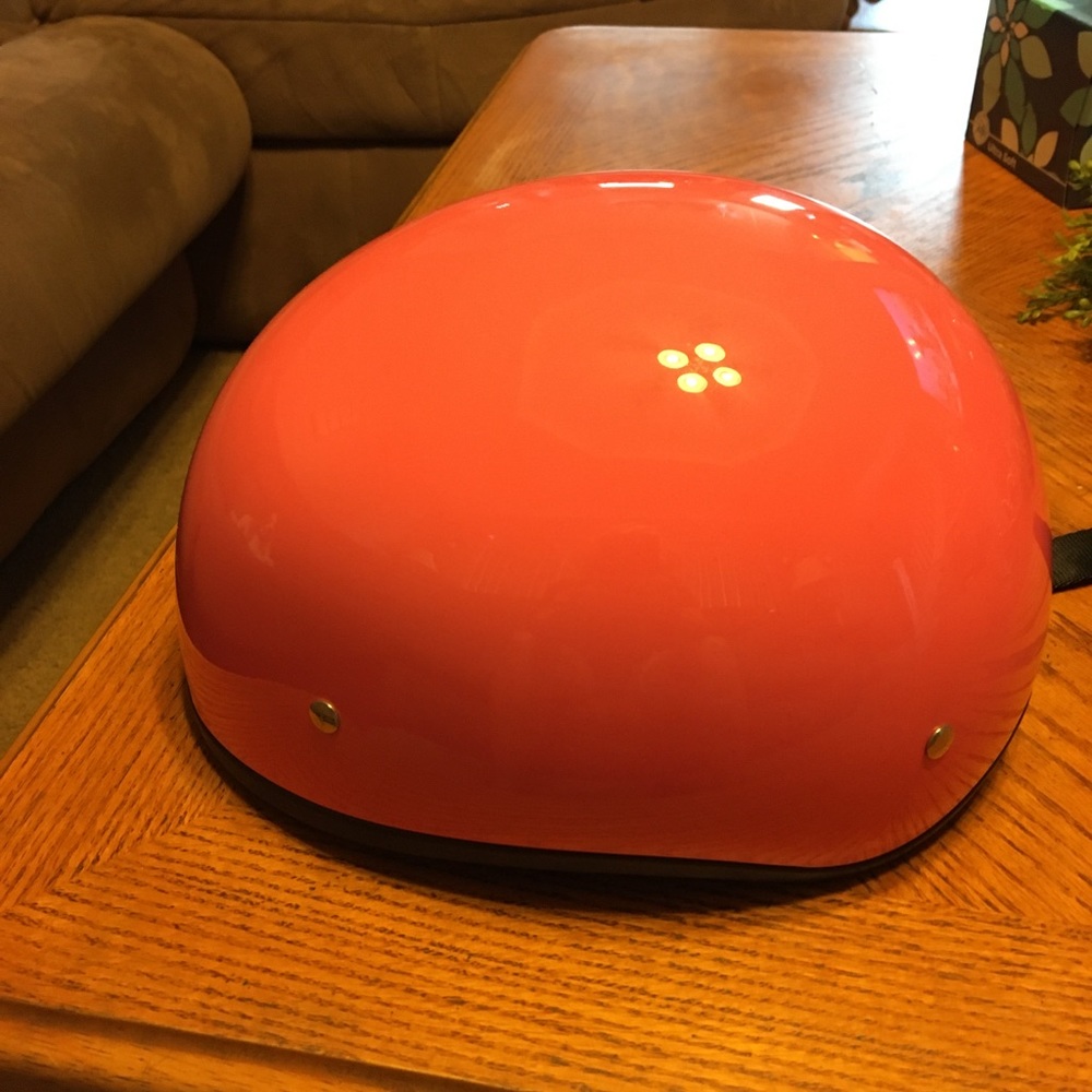 Ladies pink motorcycle helmet.